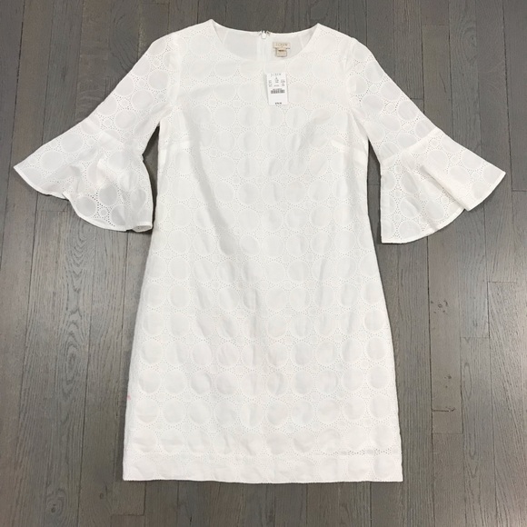 white eyelet dress with bell sleeves